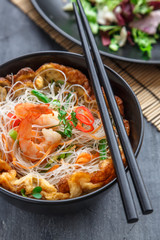 Thai style rice noodles salad with shrimps and omelette, cloxe view selective focus