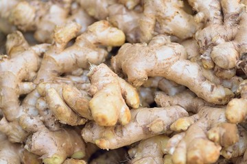 Macro details of Fresh Gingers at street side vegetable market in India 