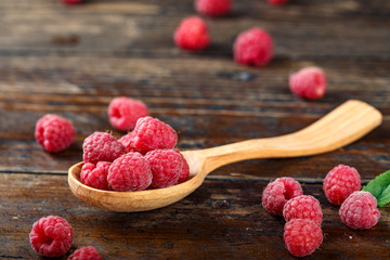 fresh raspberries in a spoon