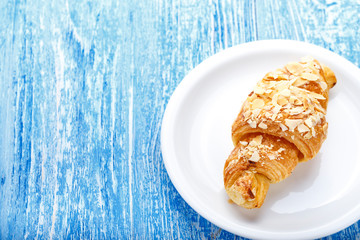 croissant in a plate with space for text