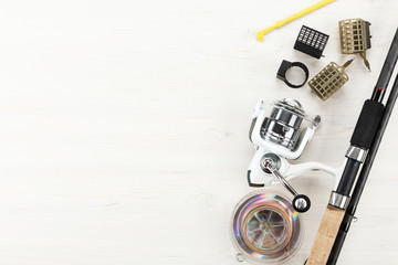 Fishing feeder and reel. Different tips of the feeder rod for bottom fishing.