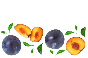 plums with leaf isolated on a white background with copy space for your text. Top view. Flat lay...