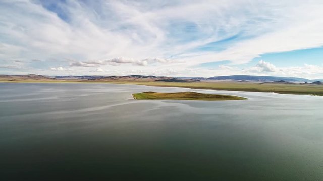 Calm Waters Of Mongolian Lake Telmen Lake Surrounded By Hills. Mongolia.