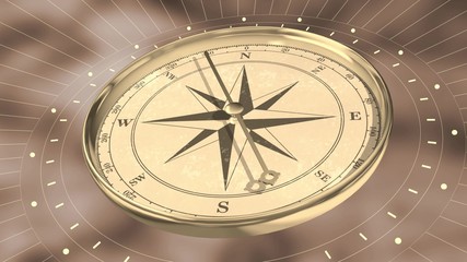 Vintage gold compass on blurred background