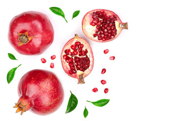 pomegranate with leaves isolated on white background with copy space for your text. Top view. Flat...