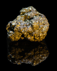 Small natural druse of pyrite on a black background with reflection