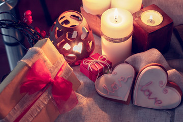 Cozy winter with candles, gifts and ginger snap