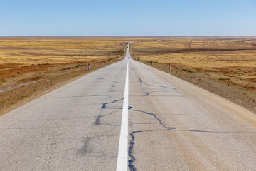 asphalt road in the mongolian steppe, Mongolia