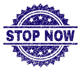 STOP NOW stamp seal watermark with distress style. Blue vector rubber print of STOP NOW title with retro texture.