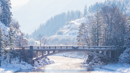 Winter landscape with bridge and river