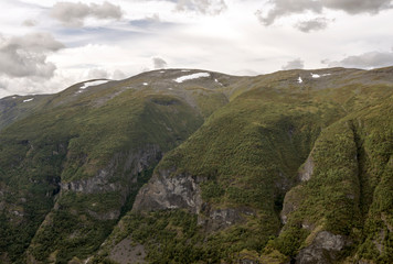 Fototapeta na wymiar Mountains in the interior of southern Norway on a cloudy day.