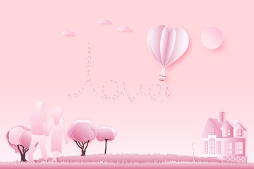 Paper art , cut and digital craft style of the lover with heart hot air balloon and sunny on pink sky background as romantic , married and honeymoon concept. vector illustration