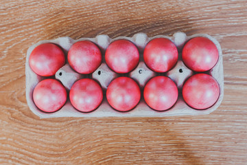 8586456 Easter scene, painted eggs in a box, top view
