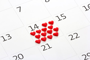 Calendar page with the red hearts on February 14 of Saint Valentines day