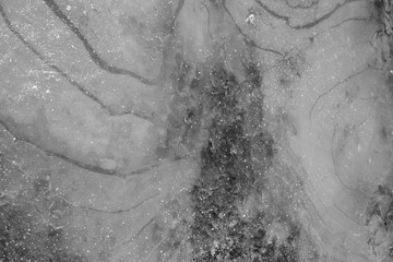 Fototapeta premium Ice pieces surface texture traces during winter season