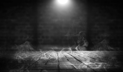 Dark background of empty street, room. Background of paving street tiles and brick wall. Spotlight, laser beams, smoke, neon light