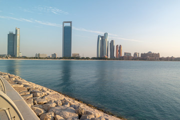 Beautiful view of Abu Dhabi city famous  towers, buildings and beach (Etihad towers)