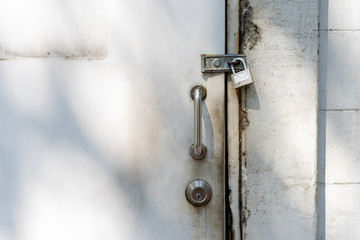 Stainless steel door handle and background photo