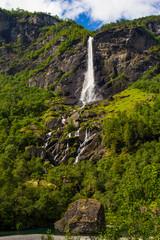 Fototapeta na wymiar Giant Rjoandefossen waterfall by the Flam to Myrdal Railway Line Norway