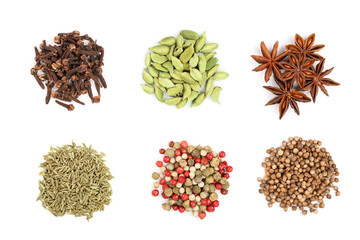 mix of spices isolated on a white background. Top view. Flat lay. Set or collection