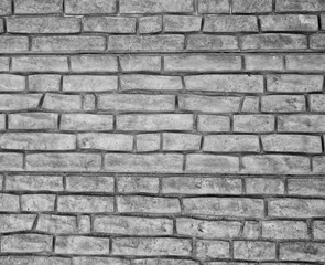 Gray background made from concrete bricks