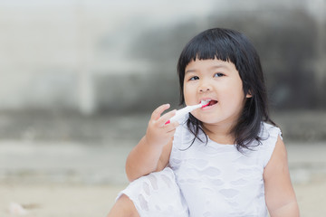 Adorable girl practice or learning for brush teeth for healthy.