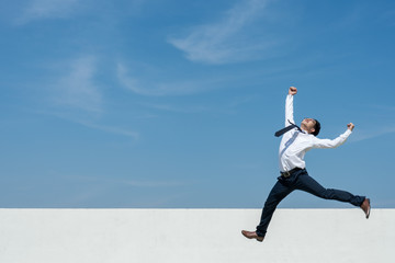 Fototapeta premium Successful concept. Businessman expressing to celebrate his success.