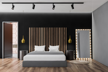 Black and gray bedroom interior, mirror
