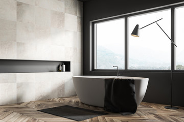 Obraz na płótnie Canvas Beige tile bathroom corner with tub