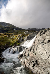 Lake in the prairies of the interior of southern Norway on a cloudy day.