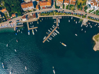 aerial view of yachts in city docks of montenegro