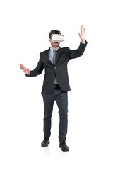 Gesturing businessman in vr glasses