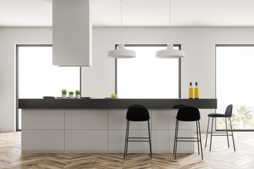 White kitchen interior with bar
