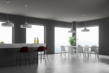 Gray kitchen corner with island and table