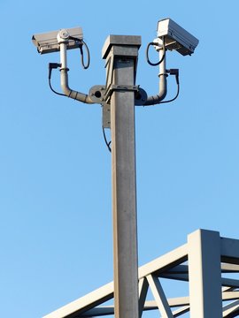 Surveillance cameras monitoring motorway traffic on the M25 in Hertfordshire, England, UK