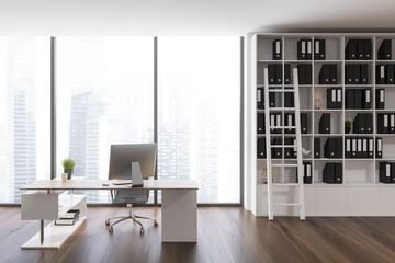 White bookcase ceo office interior
