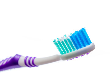 colored toothbrush on an isolated background, close up
