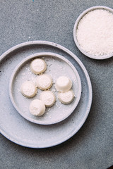 white chocolate vegan pralines or candy with coconut