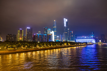Fototapeta na wymiar Zhujiang river and modern building of financial district at night in Guangzhou, China.