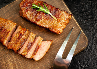 Beef steak on cutting board
