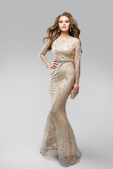 Fashion Model Evening Glittering Silver Dress, Elegant Glamour Woman in Sparkling Sexy Gown, Beauty...