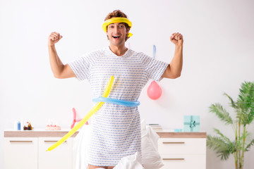 Young man celebrating his birthday in hospital