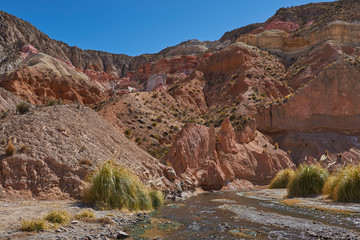 Colourful rock formations along Quebrada Allane on the Altiplano of northern Chile.