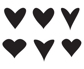 Hand drawn grunge hearts on isolated white background. Set of love signs. Unique image for design. Black and white illustration. Grungy elements for design