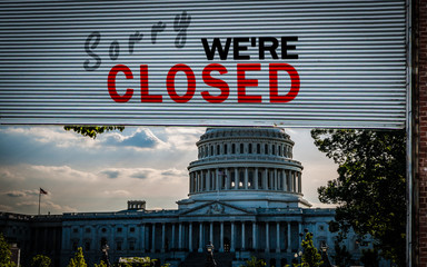 United States Capitol Building with a Old grunge weathered and dirty steel metal roller shutter door with Sorry we're closed text. USA shutdown and government closed concept