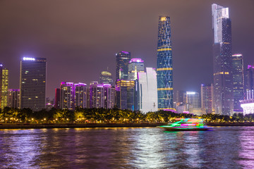 Zhujiang river and modern building of financial district at night in Guangzhou, China.