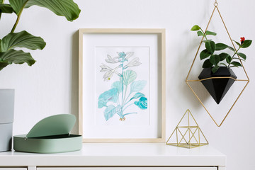 Minimalistic home interior floral poster mock up with vertical wooden photo frame,  plants, box,...