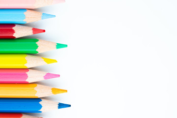 colored pencils on white background
