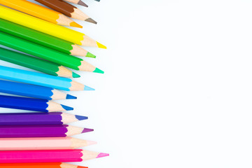 colored pencils on white background