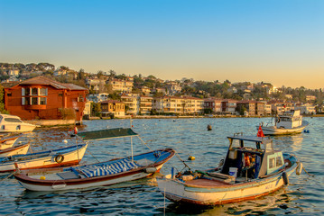 Fototapeta na wymiar Istanbul, Turkey, 17 April 2009: Bosphorus Mansions and Boats, Cengelkoy